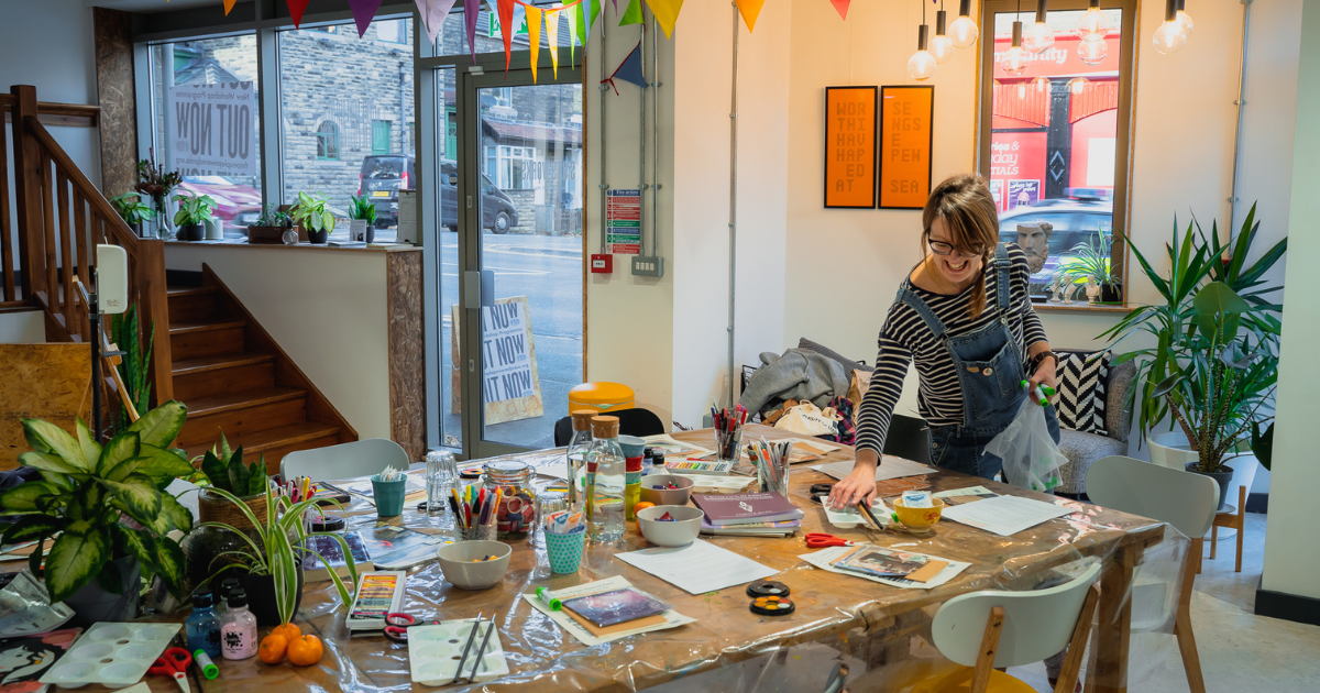 Sally setting up for an art journaling circle